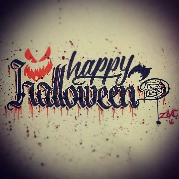 Happy Halloween in navy blackletter with a red jack-o'-lantern face, a bat and a spiderweb, dripping red