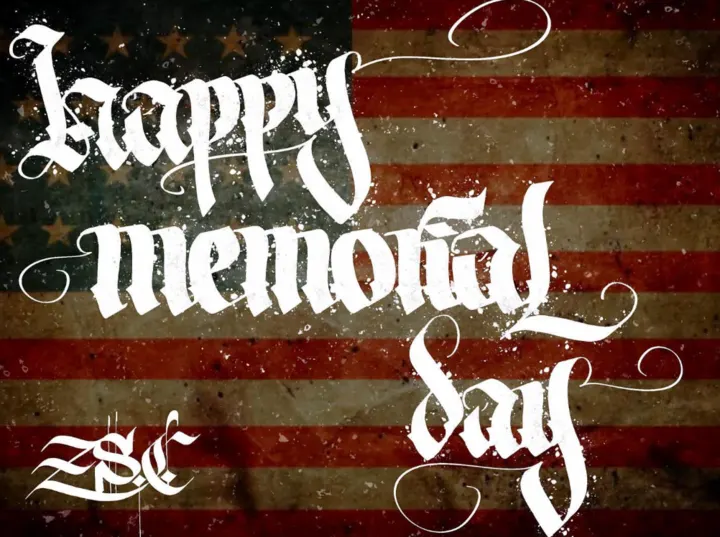 Happy Memorial Day in white blackletter over a weathered American flag