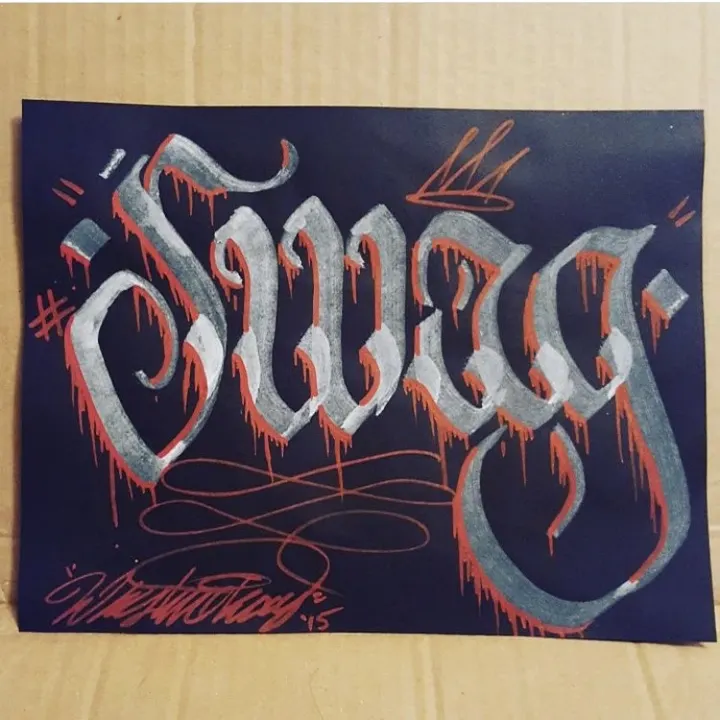 Swag in silver blackletter with red drips and a crown, on navy paper
